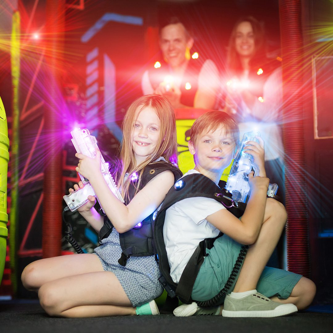 Kids having fun playing laser tag at Les Trois Monkeys Entertainment Center in Montreal.