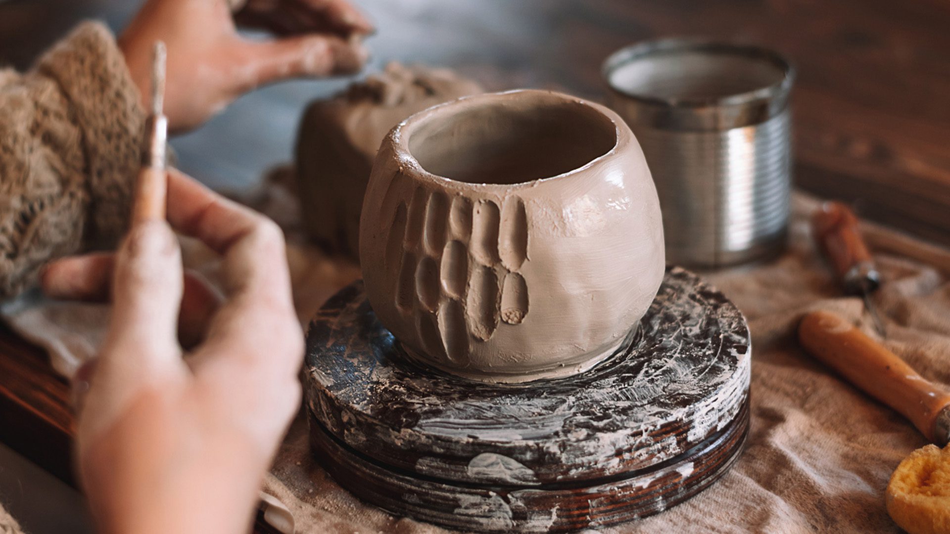 Clay cup making during the Salon des métiers d'art du Québec in Montreal.