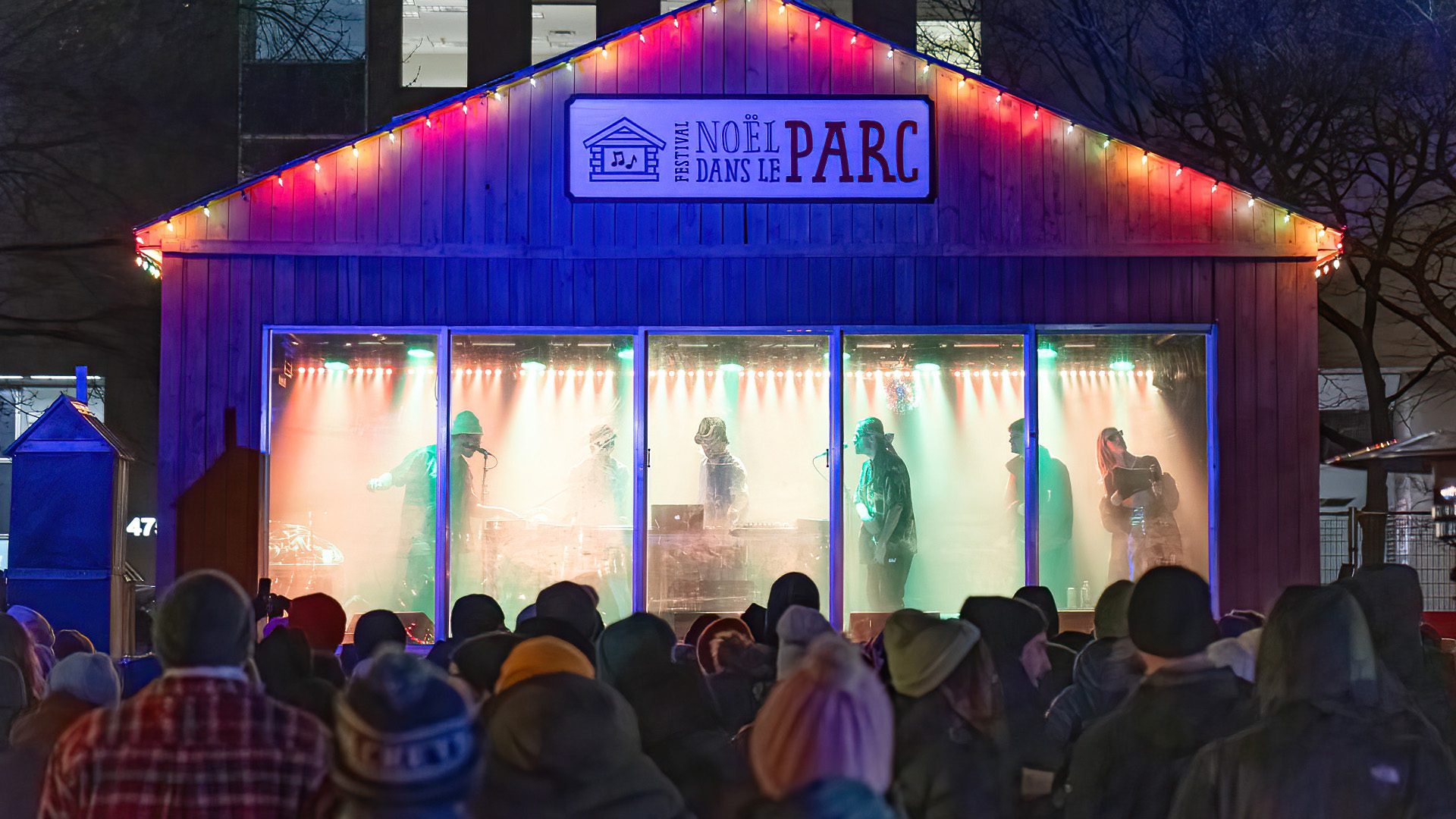 Colorful festive cottage during the Noël dans le Parc Festival in downtown Montreal.