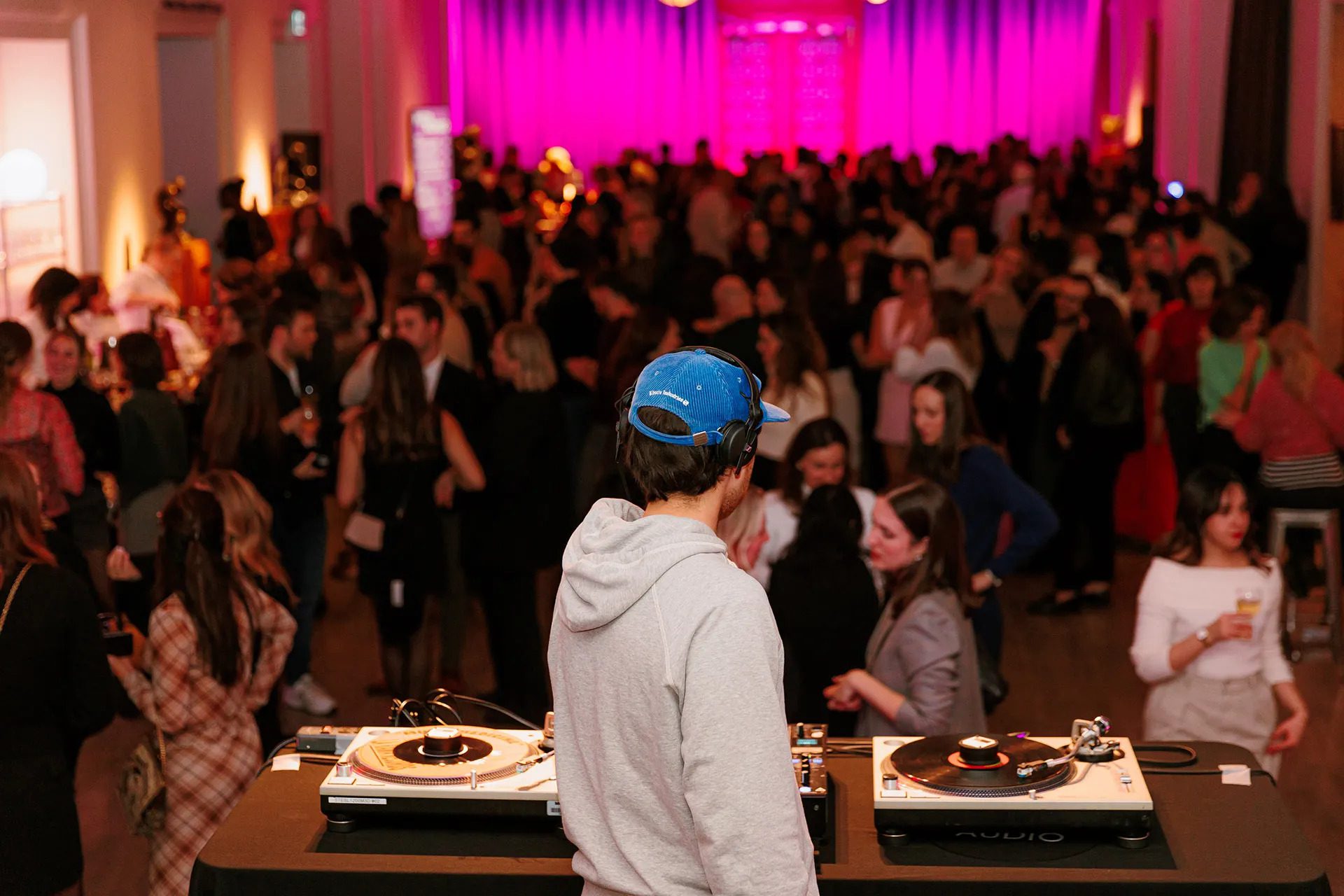 Participants enjoying a lively happy hour during the Buvette evenings at the Montreal Museum of Fine Arts.